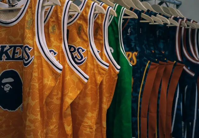 picture of jerseys hanging on shelves 