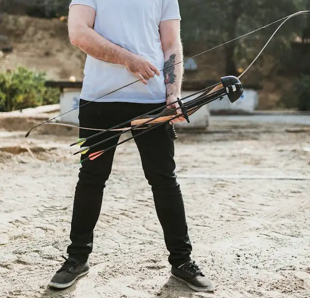 picture of a person with a recurve bow