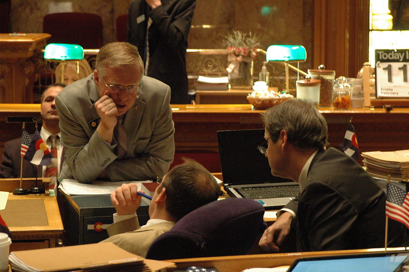 Picture of senators discussing in the senate