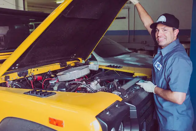 Picture of a mechanic about to repair a car 
