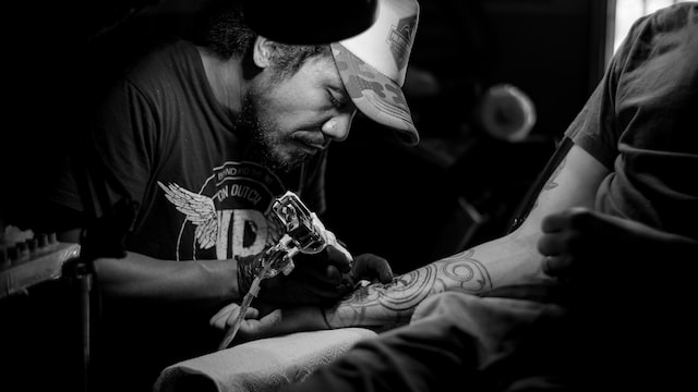 Picture of a person getting a tatoo