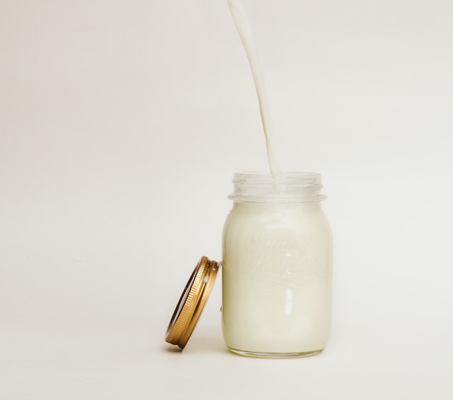 Picture of milk being poured into a jar