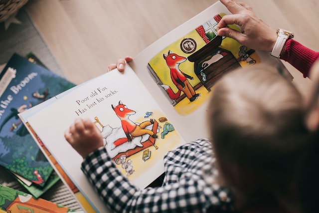 picture of a child reading a story book