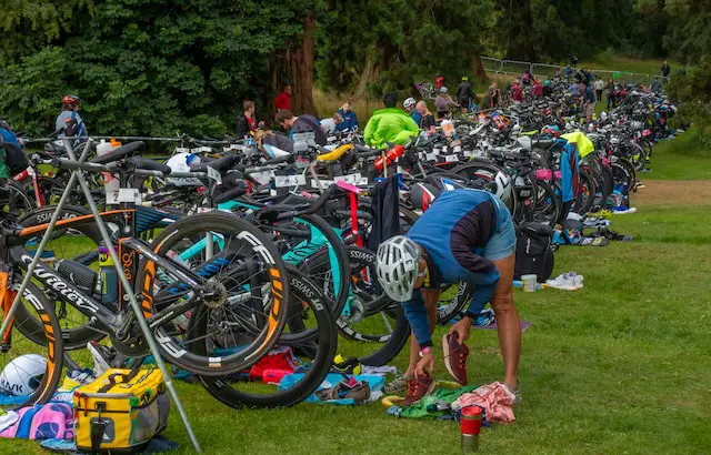 Picture of competitors preparing for the cycling leg of a triathlon