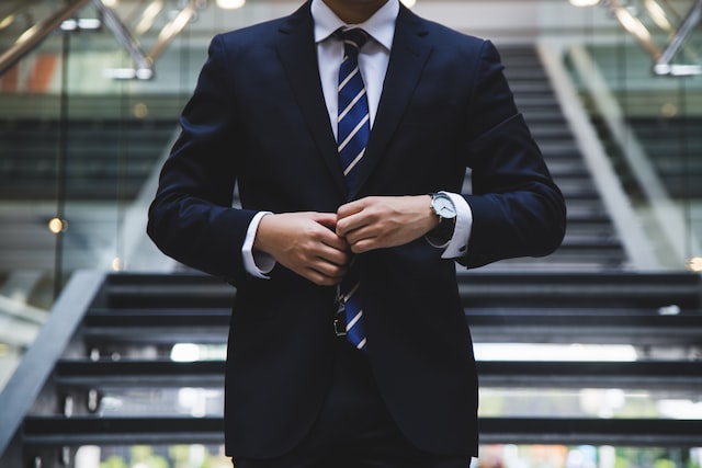 Picture of a person waring a suit