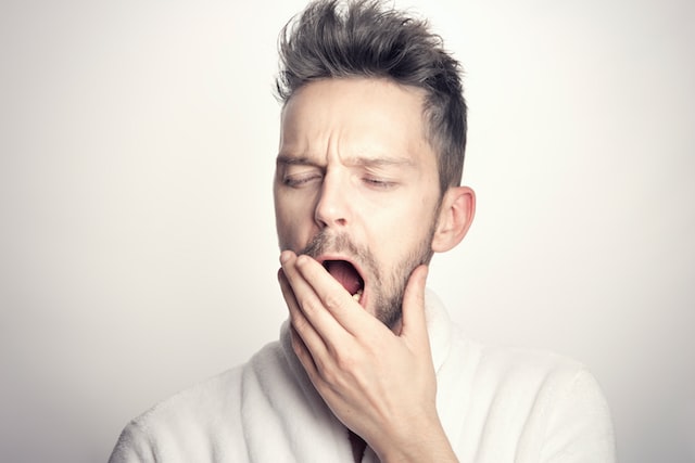 Picture of a lazy person yawning