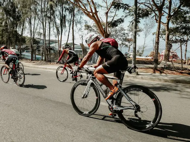Picture of a competitor participating in the cycling leg of a triathlon 