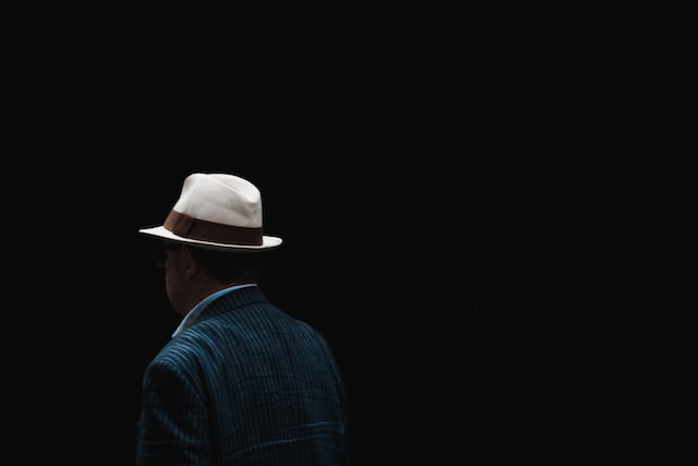 Picture of a person waring a fedora