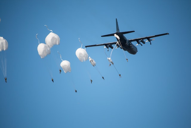 Picture of paratroopers jumping out of a plane 