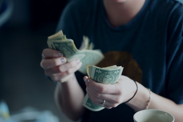 Picture of woman counting money