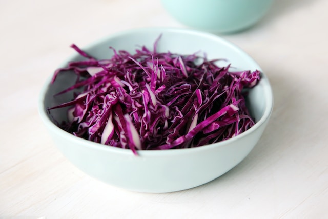 Picture of a bowl of shredded purple cabbage 