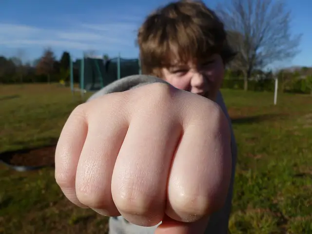 Picture of a boy with a clinched fist