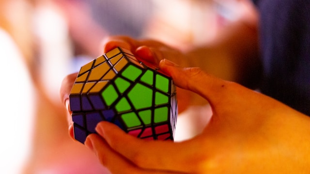 picture of a person using his intelligence to solve a puzzle