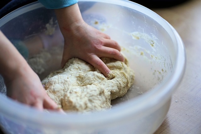 picture of a person mixing dough 