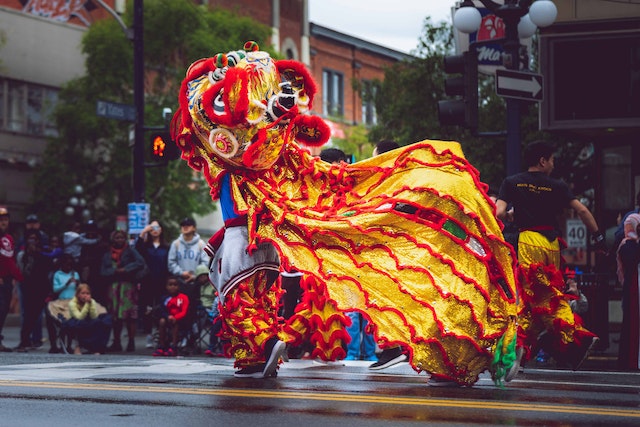 picture of a person waring a traditional Person Wearing Foo Dog Costume
 