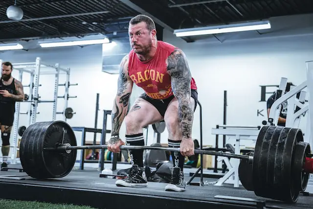 picture of an athlete powerlifting 
