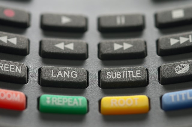 picture of a subtitle button om a remote