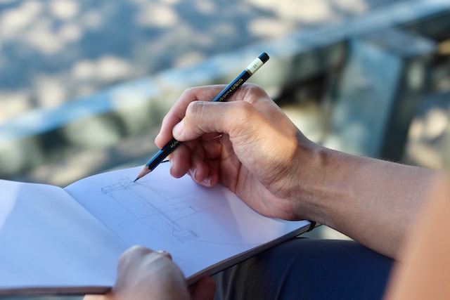 picture of a person sketching 