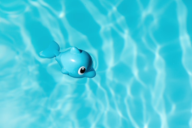 picture of a cyan colored toy in a swimming pool