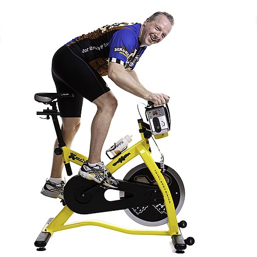 picture of a man riding an exercise bike 