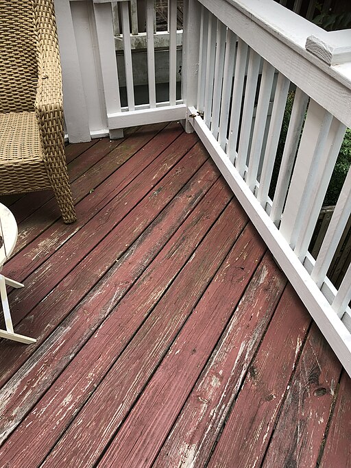 picture of a redwood deck that needs painting