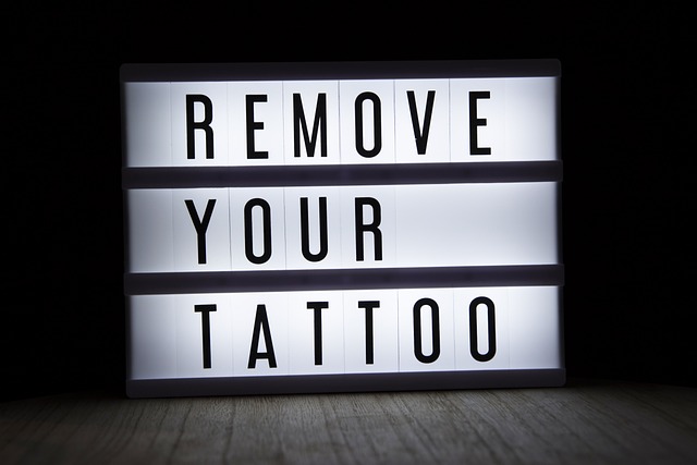 picture with the words "remove your tatoo"
