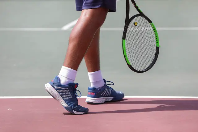picture of a tennis player waring tennis shoes 