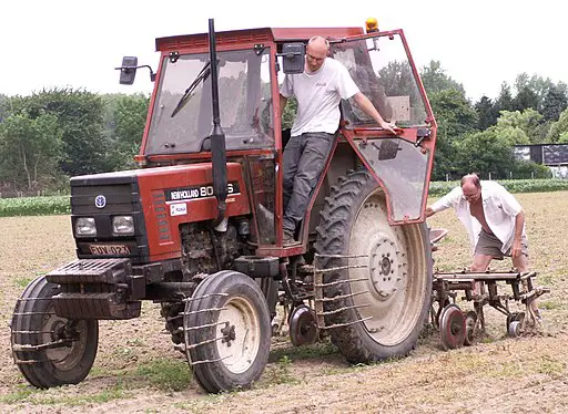 picture of a tractor mounted tiller 