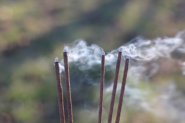 picture of incense sticks emitting aroma  