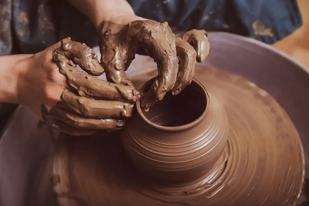 A picture showing the Dexterity of making pottery