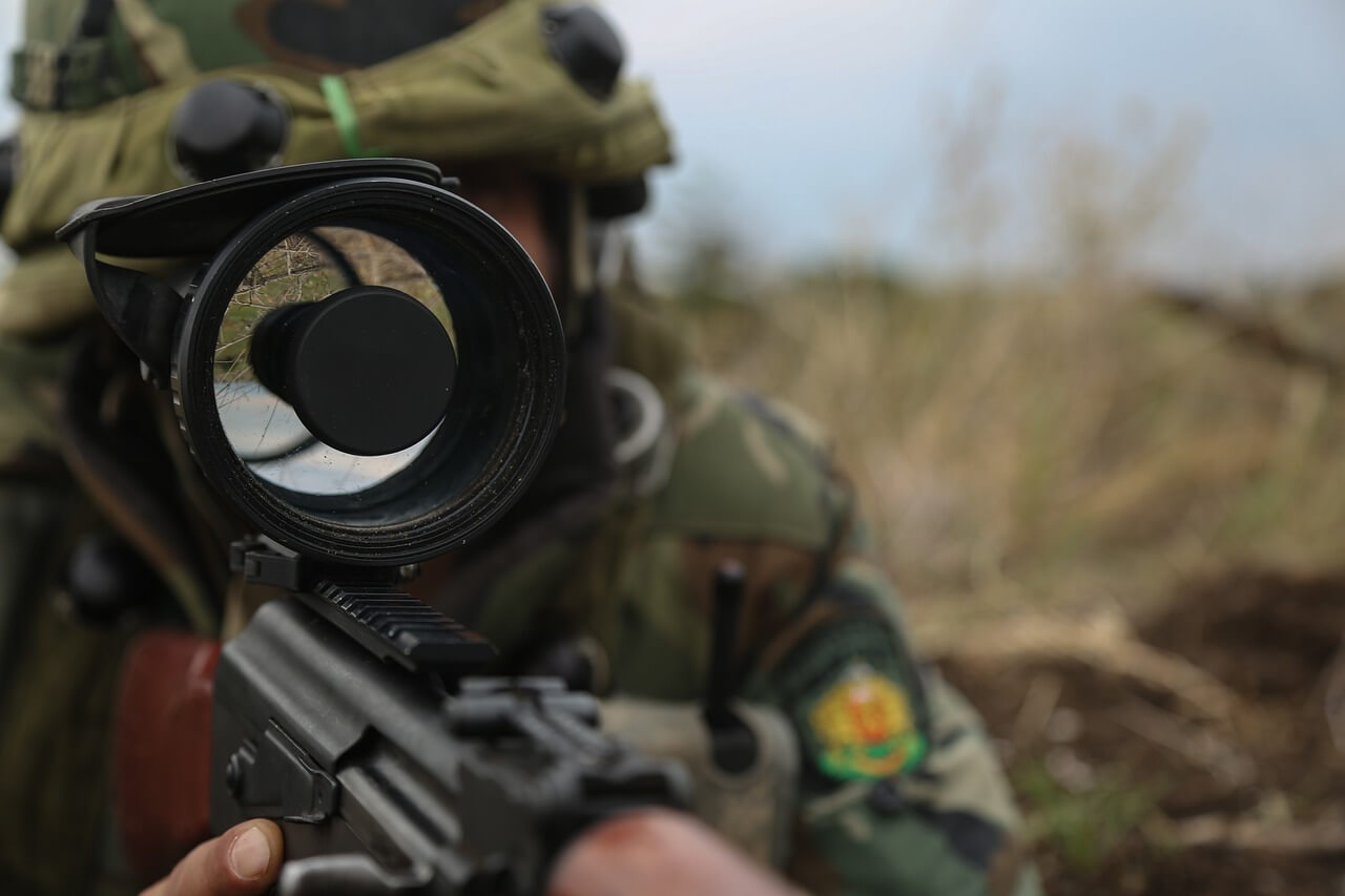 A picture of a military officer using a Bushnell Equinox